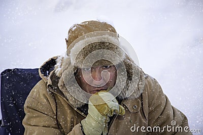 Man bundled up in sub zero winter weather Stock Photo