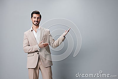 man business happy handsome grey businessman portrait copyspace smiling suit beige Stock Photo