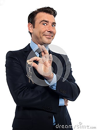 Man Businessman realtor teasing holding offering keys Stock Photo