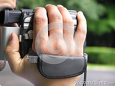 Man with camcorder Stock Photo