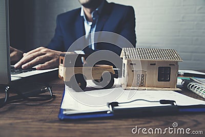 Man with car and house document Stock Photo