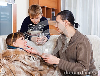 Man caring for sick wife Stock Photo