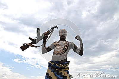 Man from the Caro tribe with AK47. Ethiopia, Omo Valley Editorial Stock Photo