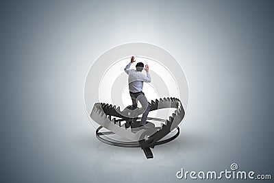 The man caught in mouse trap in risk business concept Stock Photo