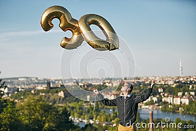 Man celebrates thirty years birthday Stock Photo