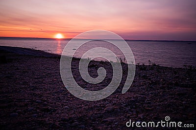 Simple beach and sand landscape with sunset ocean background Stock Photo