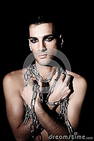 Man In Chains Stock Photo