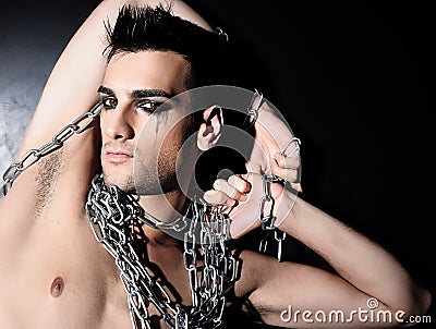 Man In Chains Stock Photo