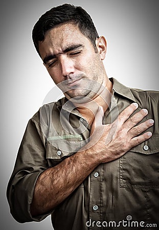 Man with chest pain or having a heart attack Stock Photo