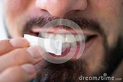 Man Chewing Wet Moist Nicotine Tobacco Snus Stock Photo