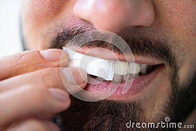 Man Chewing Wet Moist Nicotine Tobacco Snus Stock Photo