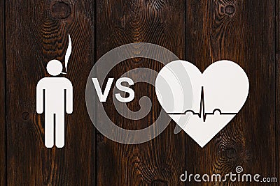 Man with cigarette and heart with echocardiogram. Quit smoking concept Stock Photo