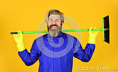 Man cleaner. bearded man cleaning with mop. Janitor in gloves. husband cleaning house. Housework and domestic duty. Male Stock Photo