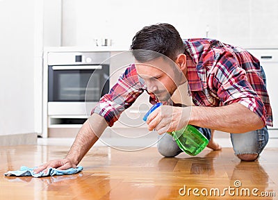 Man cleaning floor Stock Photo