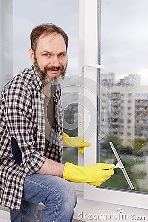 Man cleaning windows Stock Photo