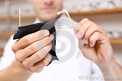 Cleans glasses Stock Photo