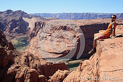 Man on cliff edge Stock Photo