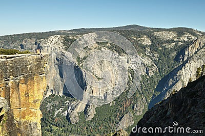 Man at cliff edge in Taf Point , Yosemite Stock Photo