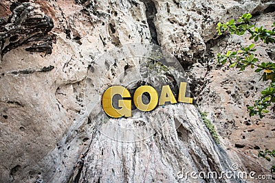 The man climb to the top of the mountain. Goal concept Stock Photo