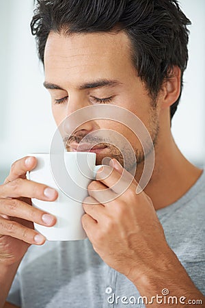 Man, coffee and cup smell for relax drink or morning breakfast beverage, calm daydream on lazy weekend. Male person, mug Stock Photo