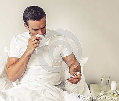 Man with common cold Stock Photo