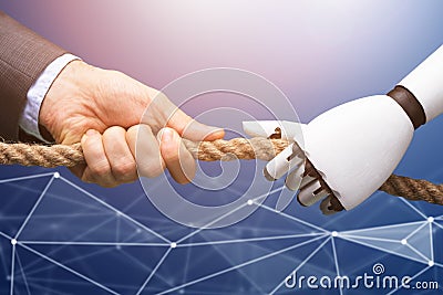 Man Competing With The Robot Pulling Rope Stock Photo