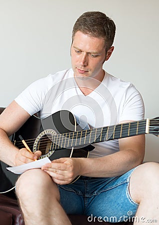 Man compose a song. Stock Photo
