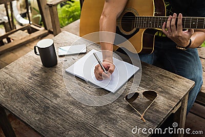 Man compose song and play guitar Stock Photo