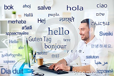 Man with computer over words in foreign languages Stock Photo