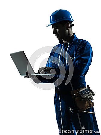 Man construction worker computing computer silhouette portrait Stock Photo