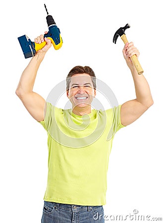 Man with cordless drill and hammer Stock Photo