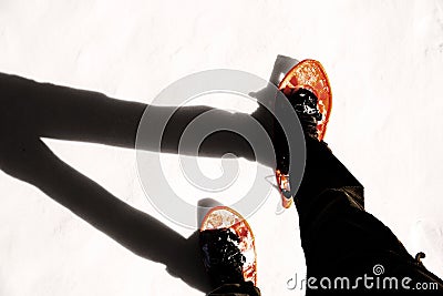 Man with corduroy pants with snowshoes with special effect Stock Photo