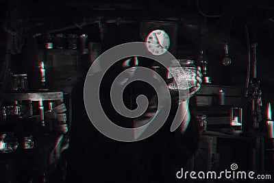 man cosplays a computer game character in the steampunk style. Cyberpunk alchemist concept with 3D glitch effect of Stock Photo