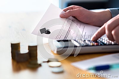 Man counting college savings fund, tuition fee or student loan. Stock Photo