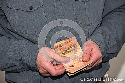 Man counting paper euro banknotes Stock Photo