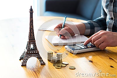 Man counting travel budget, vacation expenses or insurance cost. Stock Photo