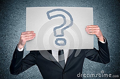 Man cover face with question board Stock Photo