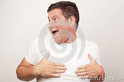 Man covering his nipples Stock Photo