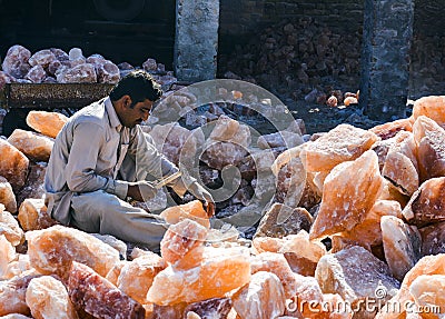 A man crafting salt lamps Editorial Stock Photo