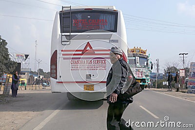 A man crossing road risking his life Editorial Stock Photo