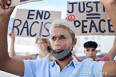 Man, crowd and protest for peace, racism and justice in street with poster in hands. People, sign and writing on Stock Photo