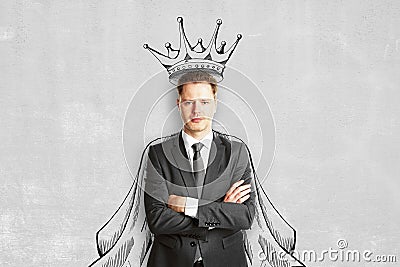 Man with crown and cape Stock Photo