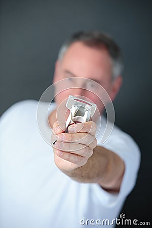 Man crushing packet cigarettes stop smoking concept Stock Photo