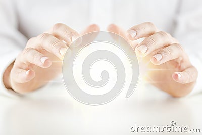 Man with a crystal ball Stock Photo