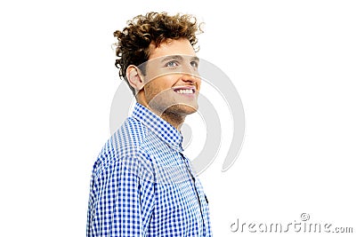 Man with curly hair looking up Stock Photo