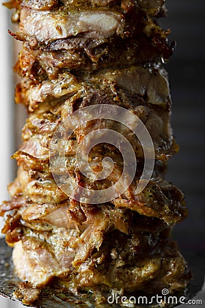 Man cutting prepared meat Stock Photo