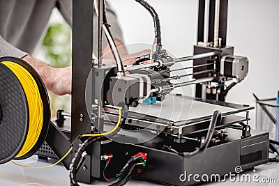 Man with 3D printer Stock Photo