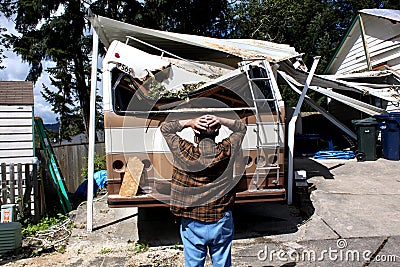 Man and damaged rv Stock Photo