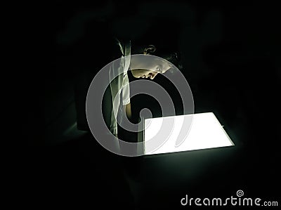 Man in the dark Stock Photo