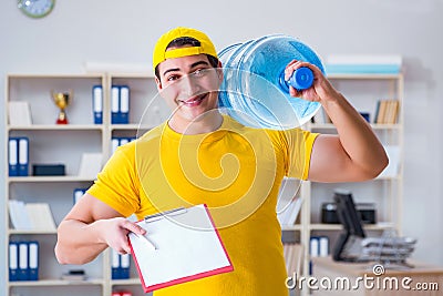The man delivering water bottle to the office Stock Photo
